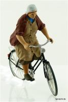 Bäuerin auf Fahrrad (Lady farmer on bicycle)