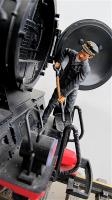 Lokschlosser beim Entschlacken ( Locomotive mechanic purging boiler slag)